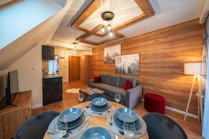 Apartment (G10) | Wohnbereich | Flachbildfernseher
