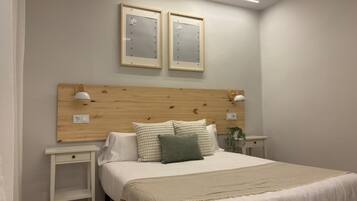 2 slaapkamers, een strijkplank/strijkijzer, reisbedje, gratis wifi