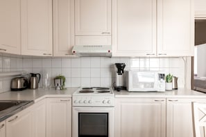 Apartamento conforto | Cozinha privada | Geladeira, micro-ondas, fogão, cooktop