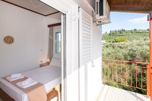 Apartment, 2 Bedrooms, Balcony | 2 bedrooms, iron/ironing board, bed sheets