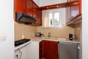 Apartment, 2 Bedrooms, Balcony | Private kitchen | Fridge, stovetop, espresso maker, electric kettle
