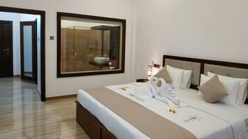 Premium bedding, minibar, desk, laptop workspace