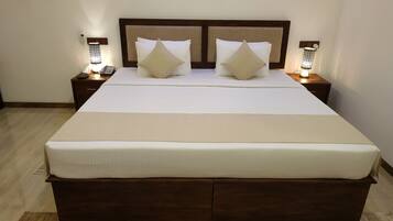 Premium bedding, minibar, desk, laptop workspace