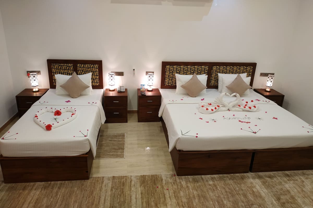 Deluxe Triple Room | Premium bedding, minibar, desk, laptop workspace