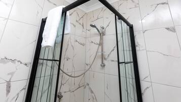 Shower, rainfall showerhead, free toiletries, hair dryer