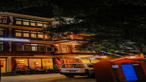 A multi-story hotel with a sign indicating it is a hotel. - MeroStay 124 (Kathmandu)
