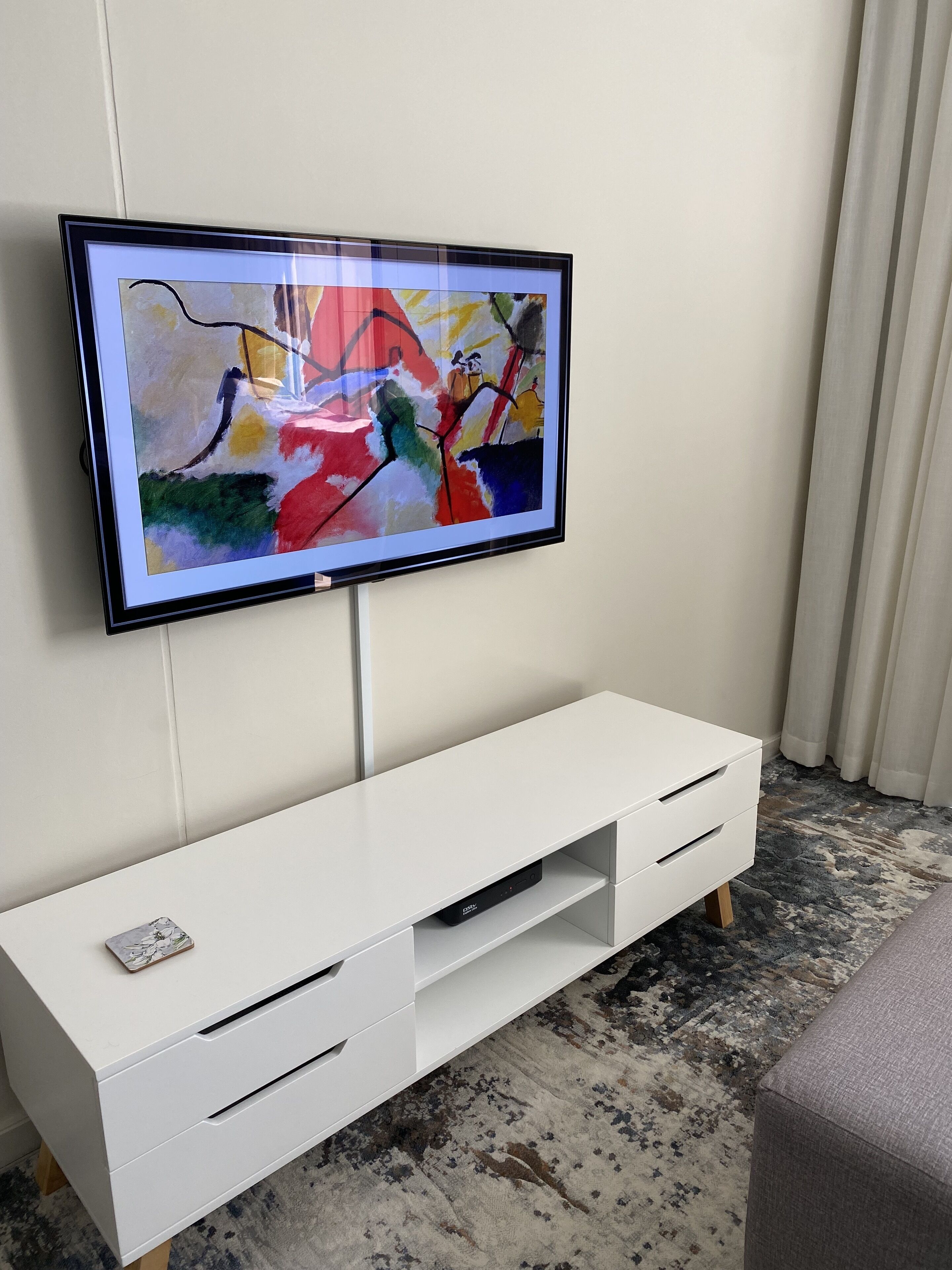 Grand Studio | Living area | 50-inch flat-screen TV with cable channels, TV, streaming services