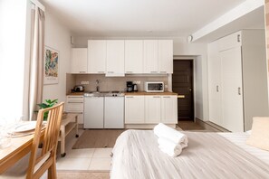 Monolocale comfort | Ferro/asse da stiro, culle/letti per bambini (a pagamento)