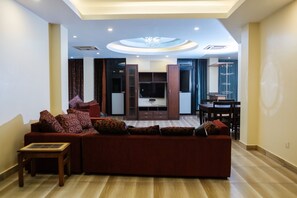 Departamento Royal | Sala de estar | Televisión y estación para iPod