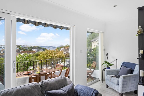 Enjoy a city view from the balcony, where you can sit and dine with a potted plant nearby.