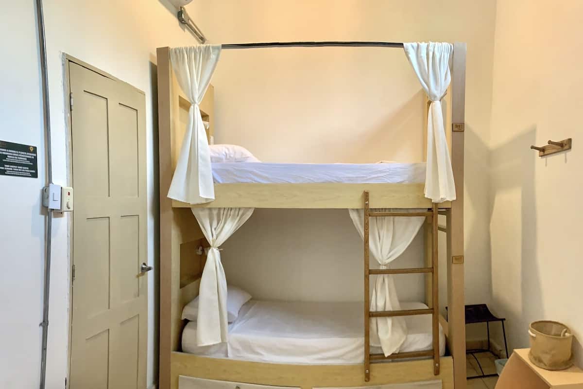 Basic Quadruple Room, Shared Bathroom | Free WiFi, bed sheets