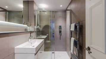 Bathtub, hair dryer, towels
