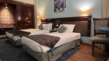Comfort Triple Room | Select Comfort beds, minibar, desk, laptop workspace