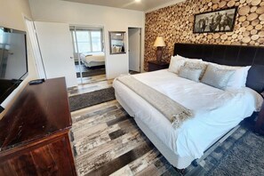 2 habitaciones, tabla de planchar con plancha y cuna de viaje 