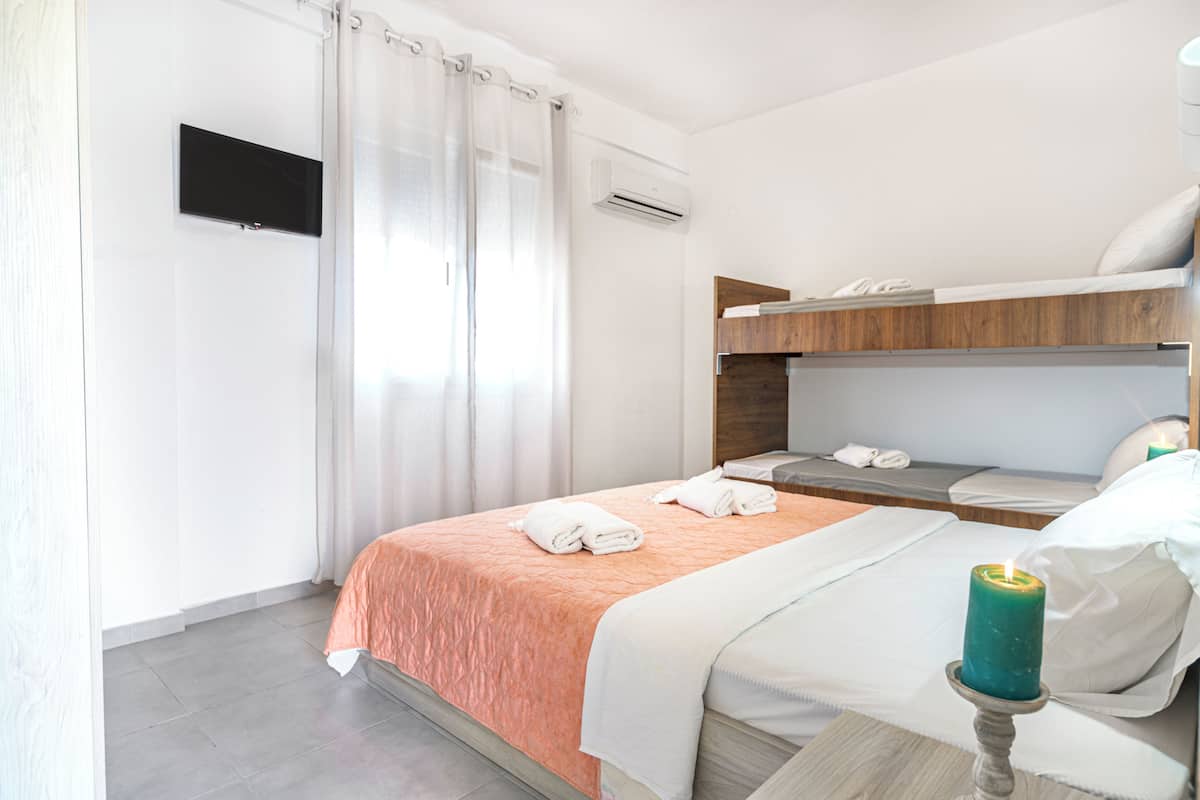 Habitación cuádruple familiar | Ropa de cama hipoalergénica y insonorización