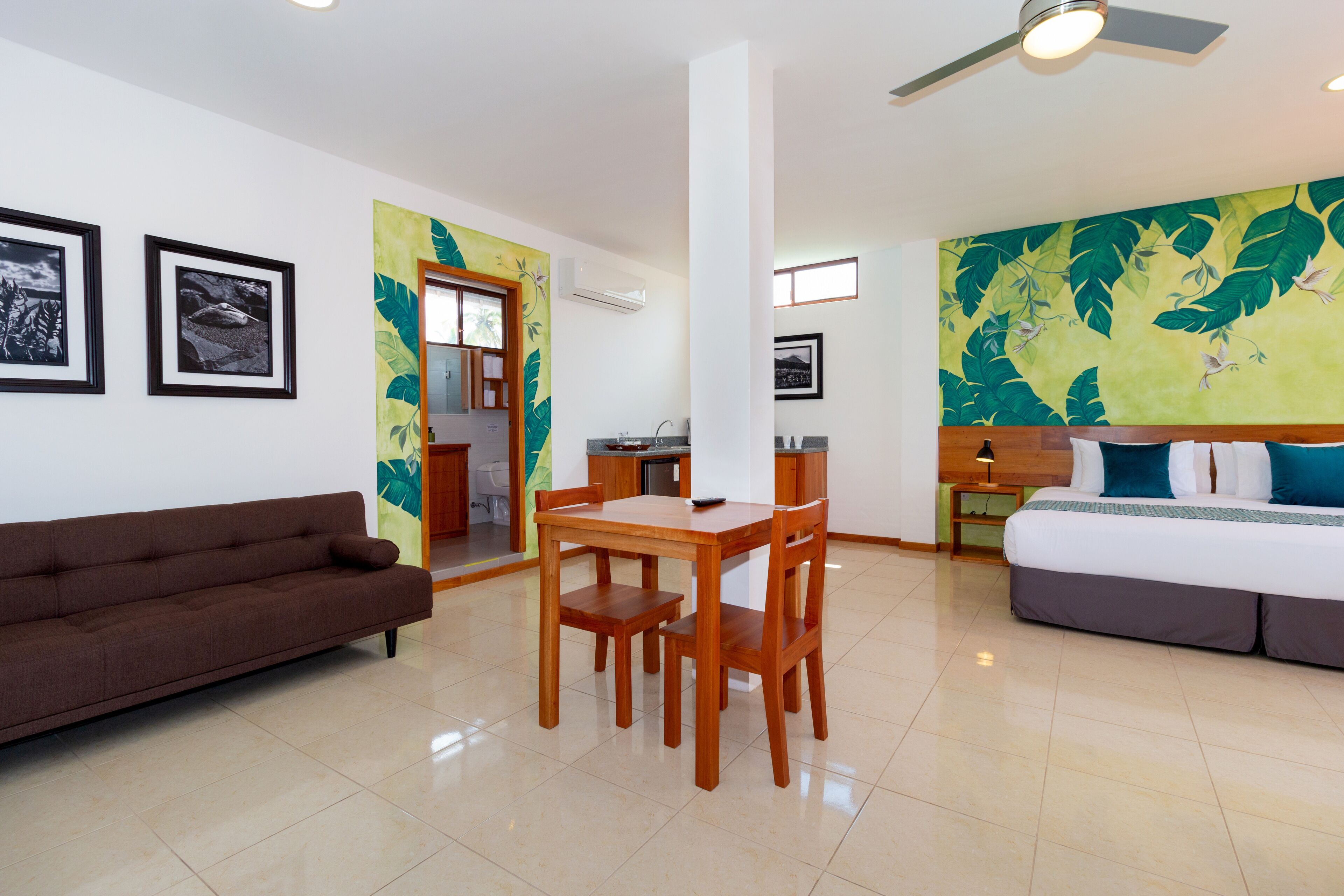 Superior Triple Room | Living area | 30-inch Smart TV with cable channels, TV