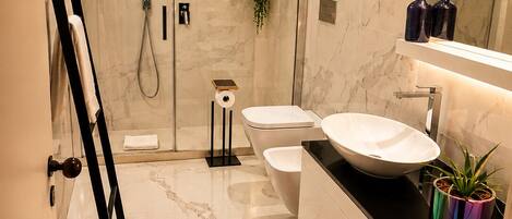 Shower, eco-friendly toiletries, hair dryer, bidet