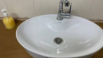 Standard Quadruple Room | Bathroom | Slippers