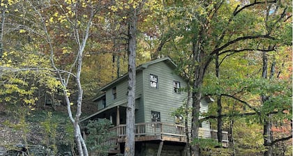 Mulberry River Front cottage near OHV/ATV trailheads at Cass Arkansas. Save 10% per day 5 nights or more.