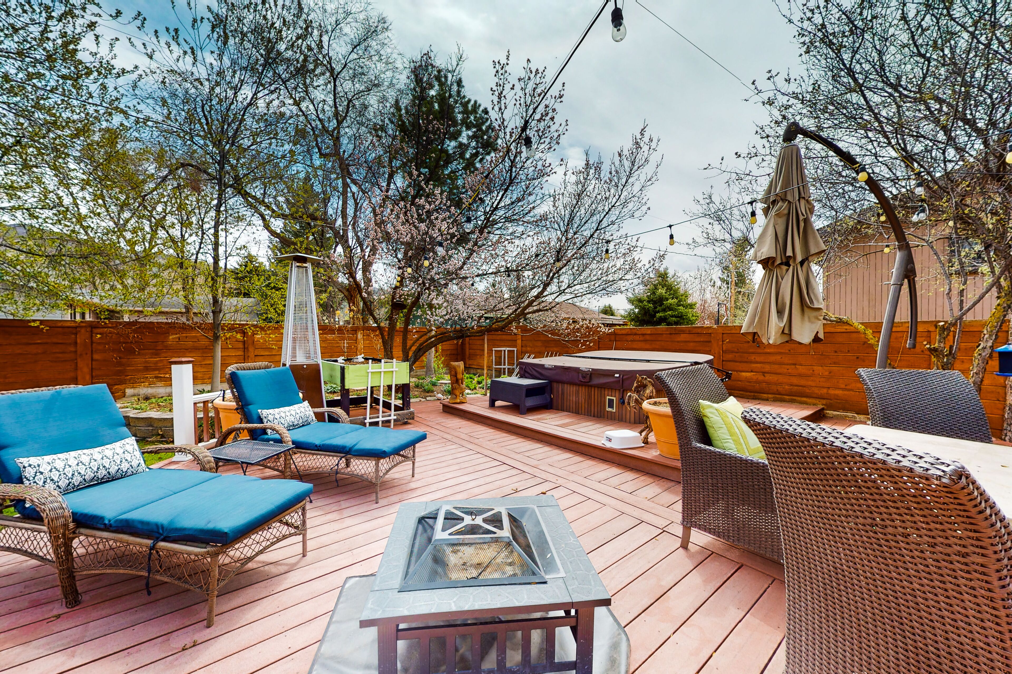 Inviting home with private hot tub, amazing deck & prime location