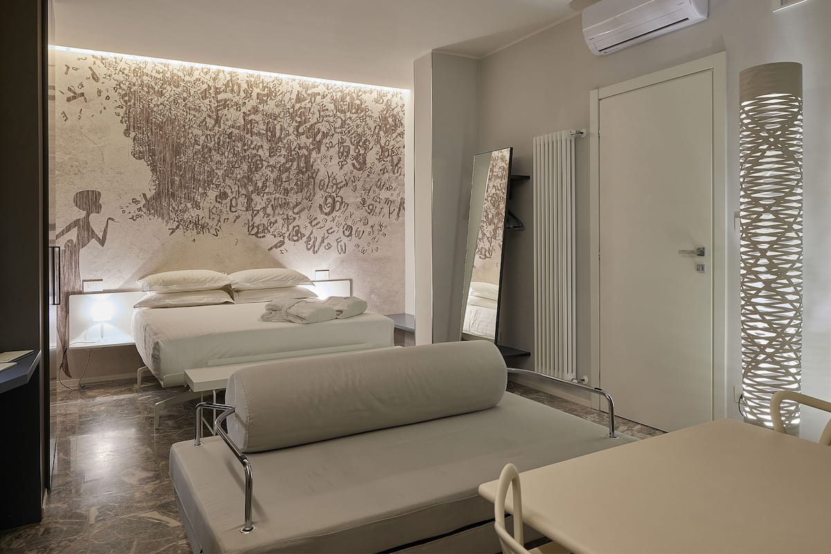 Suite de lujo, balcón (Lettera) | 1 habitación y artículos del minibar gratis