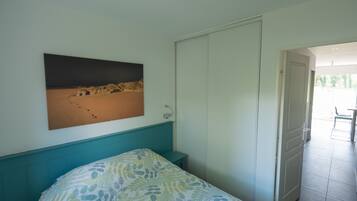 1 chambre, fer et planche Ă repasser, draps fournis