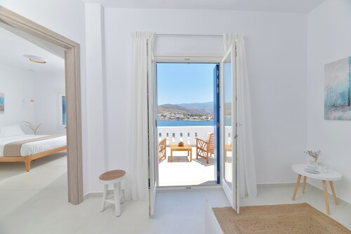 Sea-side Villa Hydroussa by Andros Homes, ideal for a relaxing retreat.