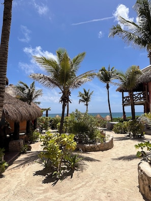 On the beach, free beach cabanas, beach umbrellas, beach towels