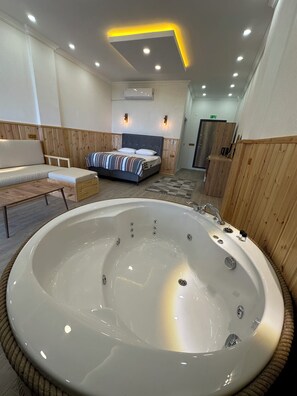 Quarto casal superluxo | Banheira de hidromassagem
