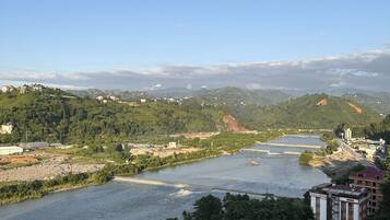 Enjoy breathtaking views of the river valley and surrounding hills from this hotel's scenic location.