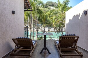 Suíte elite, 1 cama de casal, sacada, vista para o mar | Vista do quarto