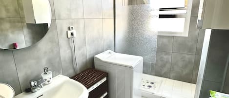 Shower, towels, soap, shampoo