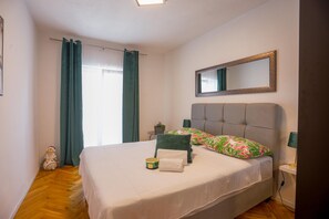 Departamento | 2 habitaciones, tabla de planchar con plancha y wifi gratis 