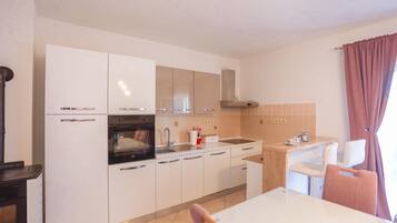 Apartment | Private kitchen | Fridge, oven, stovetop, dishwasher