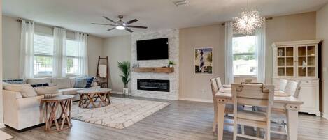 Smart TV, fireplace, books, offices