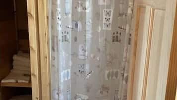 Shower, towels, soap, toilet paper