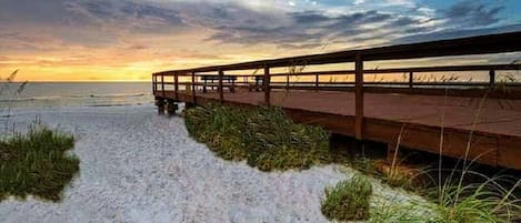 On the beach, sun loungers, beach towels