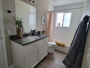 Hair dryer, towels, soap, shampoo