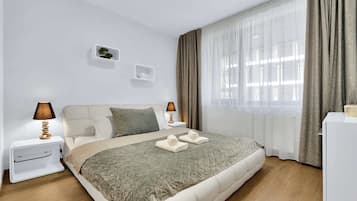 1 slaapkamer, een strijkplank/strijkijzer, wifi, beddengoed