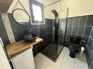 Shower, hair dryer, towels, soap