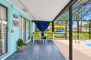 The sprawling outdoor area invites you to immerse yourself in a world of relaxation, recreation, and exploration. - Cozy Oasis Screened Pool Picturesque Water Canal Views! (Port Richey)