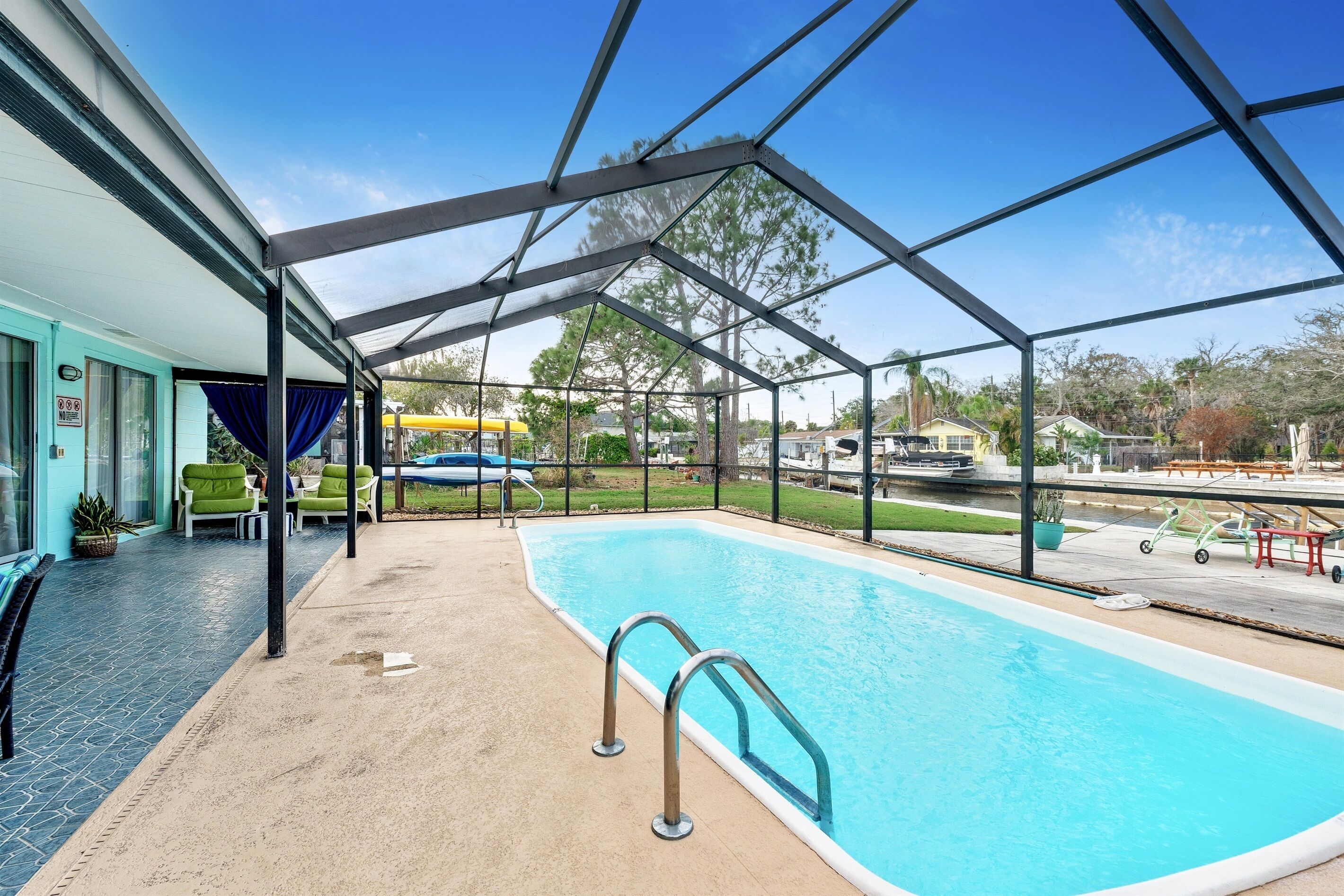 Cozy Oasis Screened Pool Picturesque Water Canal Views!