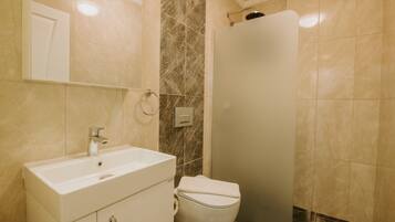 Luxury Apartment, 1 Bedroom, Sea View, Sea Facing | Bathroom | Shower, hydromassage showerhead, free toiletries, hair dryer