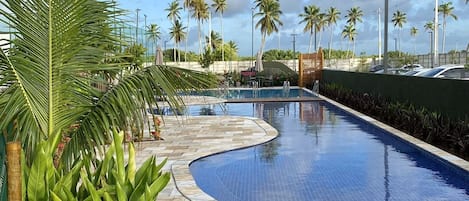 7 outdoor pools, open 9:00 AM to 10:00 PM, free cabanas, pool umbrellas