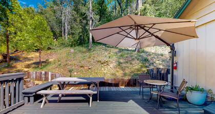 Updated home with spacious deck, grill, fireplace & updated interior