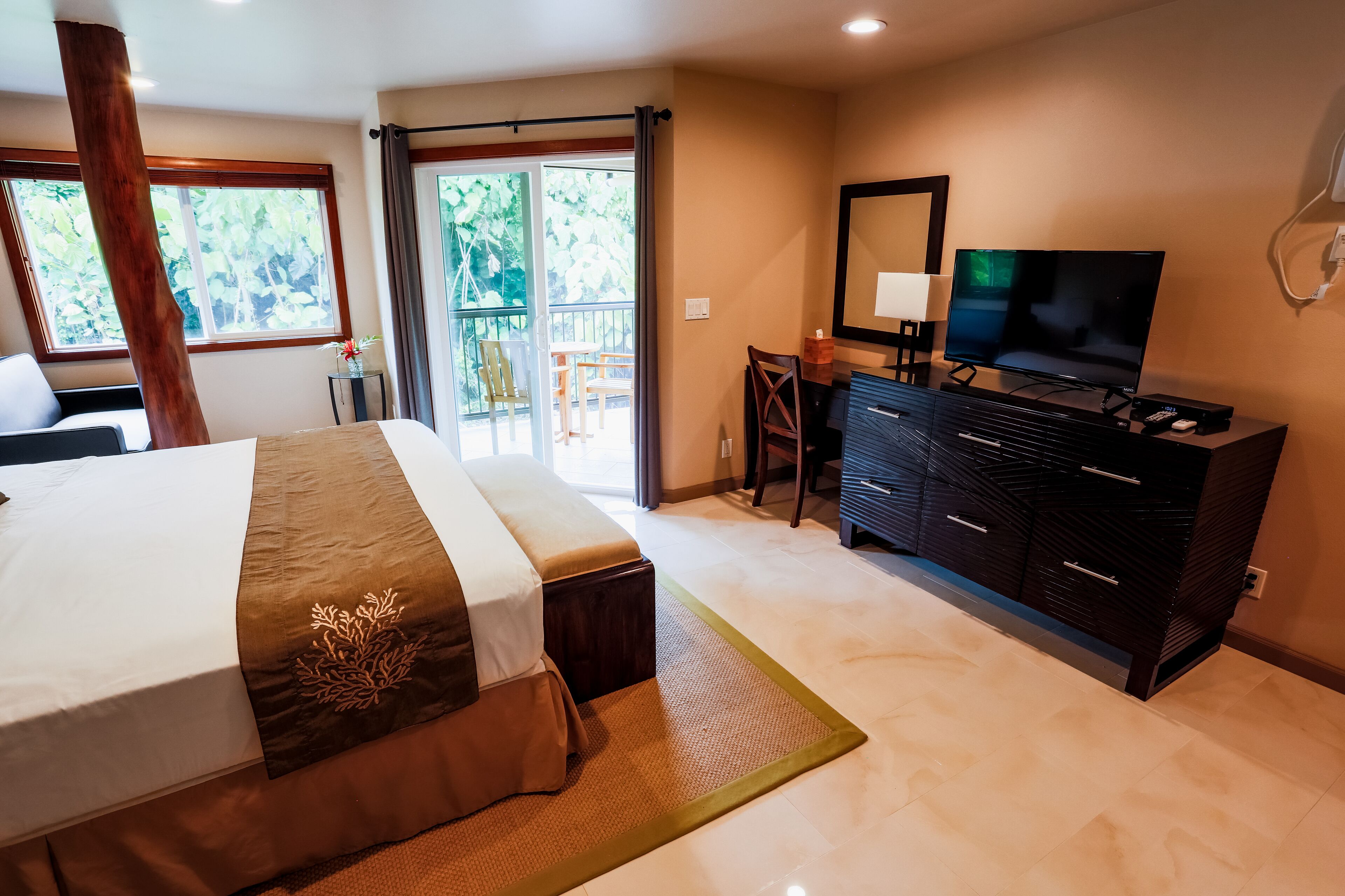 luxury studio suite, 1 king bed, garden view plumeria | premium bedding, pillow-top beds, in-room safe, individually decorated