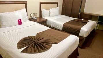 Premium bedding, down comforters, desk, laptop workspace