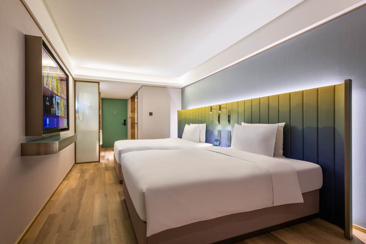 Ropa de cama de alta calidad, edredón y artículos del minibar gratis