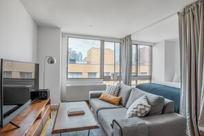 TV, stereo - Divine Chelsea Jr 1BR w/ Sundeck & Doorman, nr Subway, by Blueground (Downtown)