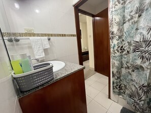 Hair dryer, towels, soap, shampoo